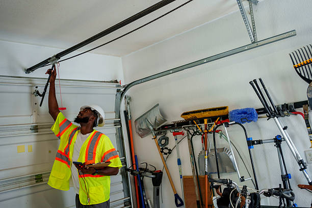 Professional Garage Door Installation technician working in Lely, FL